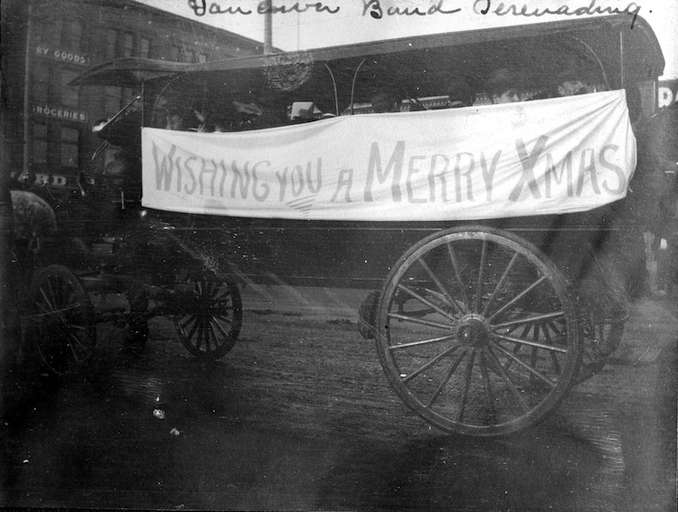 1905-Vancouver Salvation Armyband serenading from horse drawn carriage with Christmas banner