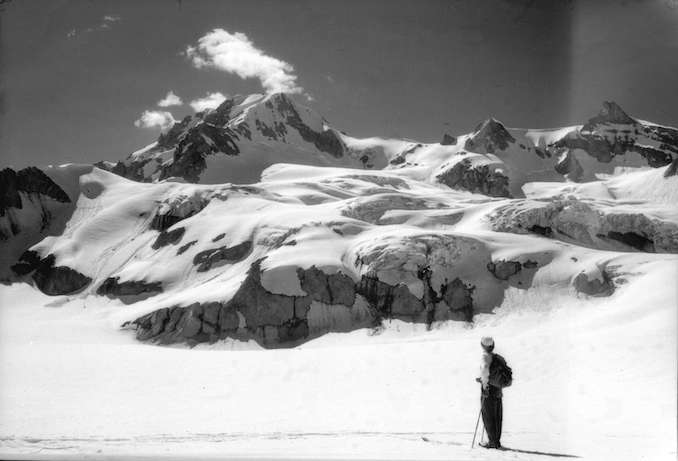 1945-Skier looking at Mount Garibaldi from Garibaldi Neve