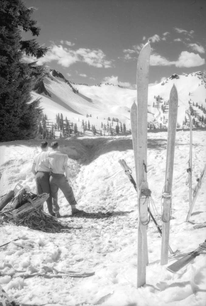 1945-Two guests at the winter camp at Garibaldi Hostel [ooking towards the slopes of Lava Mountain