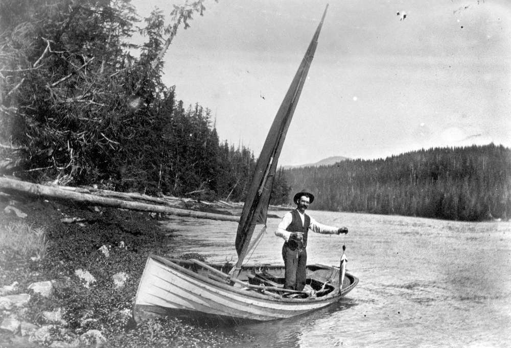 1890?-Unidentified man in boat with fish