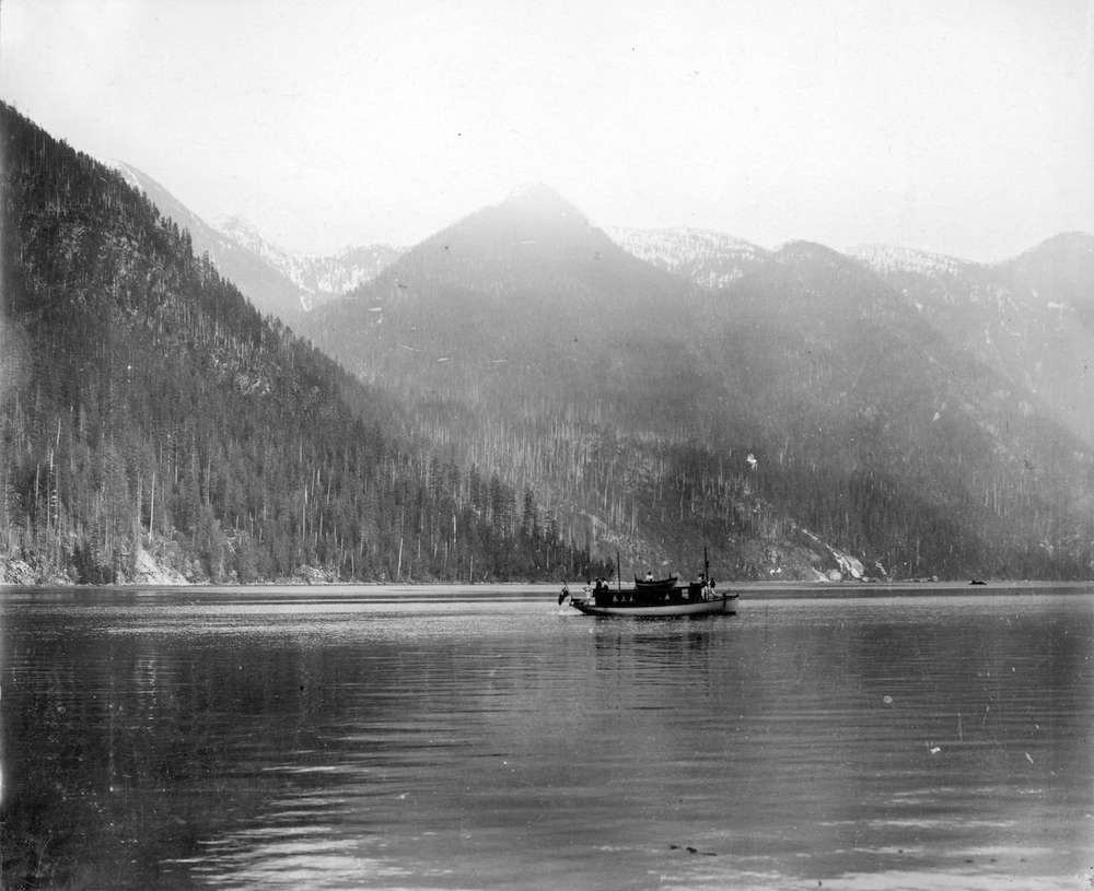 1910?-Photograph shows a boat up the North Arm of Indian River near Granite Falls