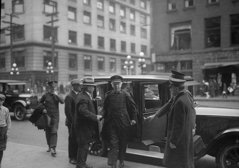 1920-Salvation Army official getting out of a car