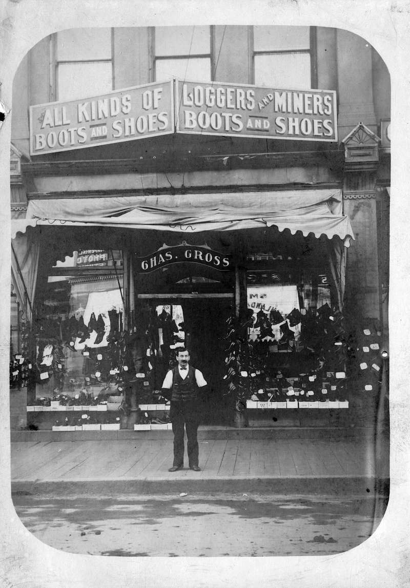 1893-[Charles Gross in front of his shoe store at 313 Carrall Street]
