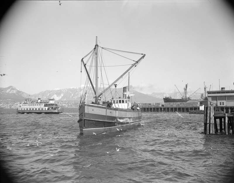 1948 - Boat leaving a dock in Vancouver as the North Vancouver ferry is pulling in