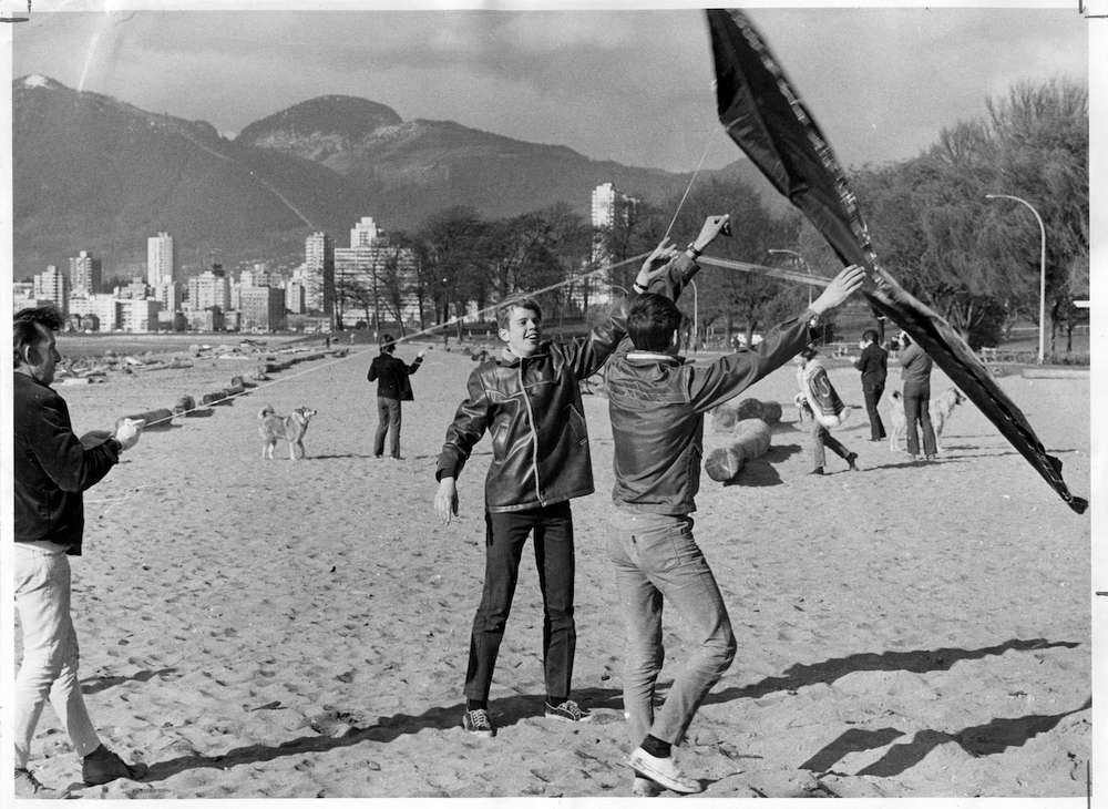 1970-Ted Rawson flying kite on Kitsilano Beach-Credit-Pugstem Publications