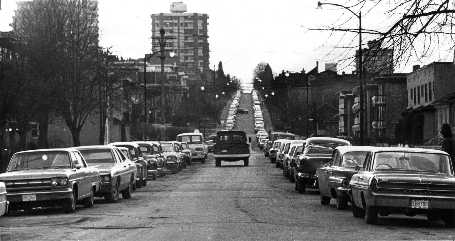 1970 - Lines of parked cars along West First in Kitsilano