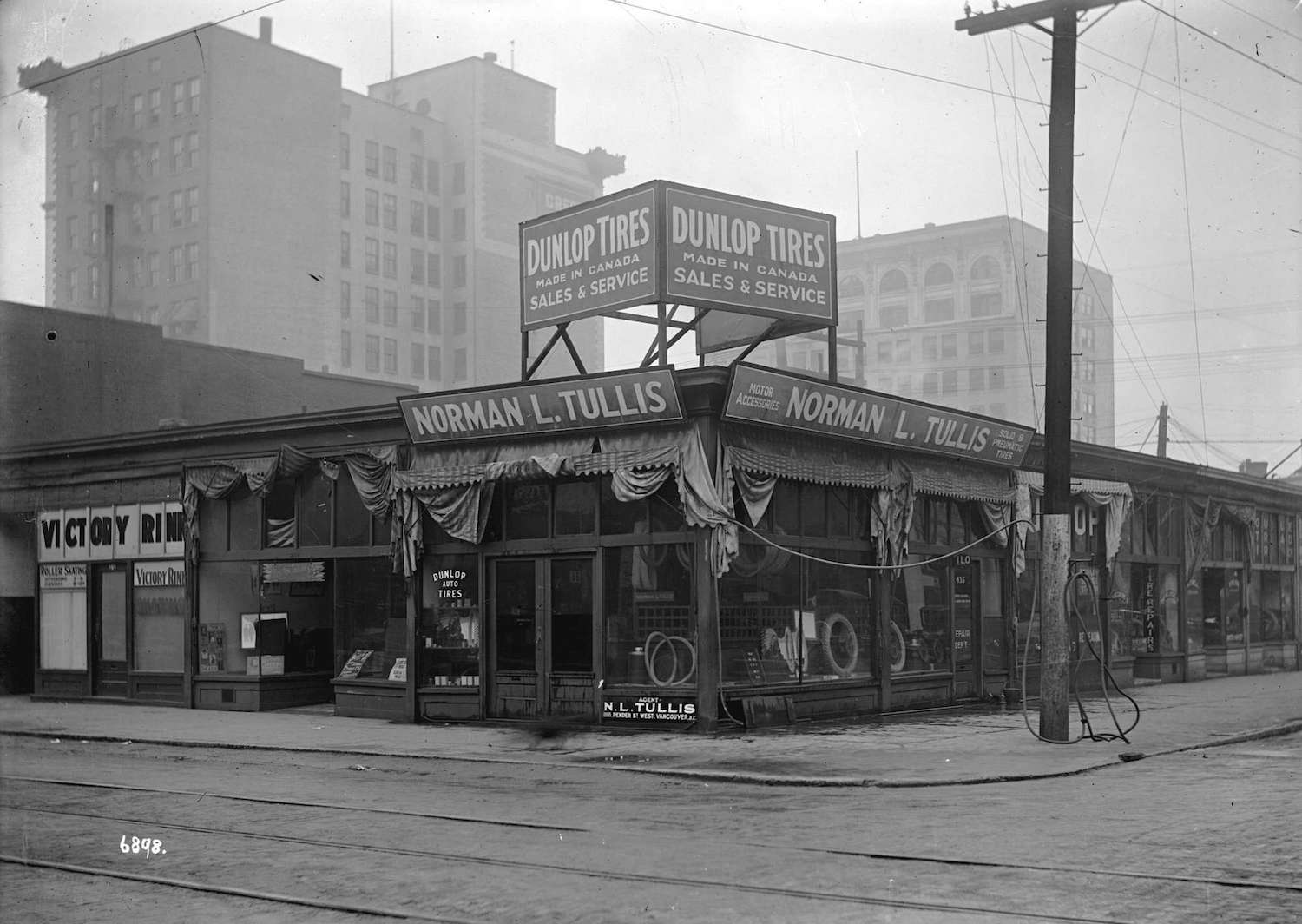 1918 - N. Tullis Motor Accessories Store, Pender and Howe Streets - Storefronts