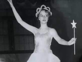 Old black and white photograph of Peggy Lordly dancing.