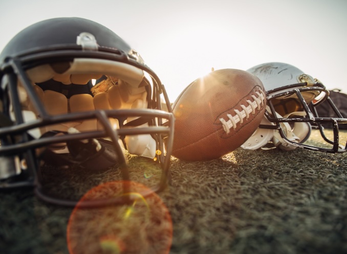 football helmets and a football.