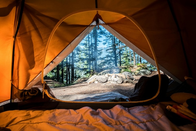 camping tent open showing the nature outside