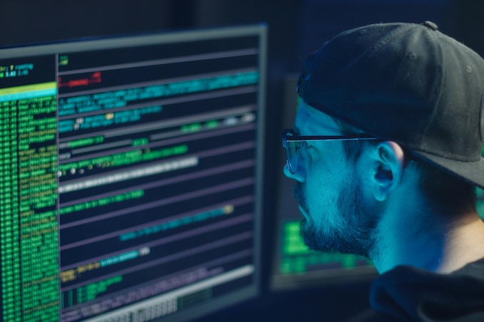 Guy looking at a computer screen