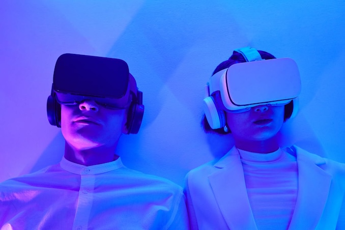 Two guys with VR headsets in Blue room