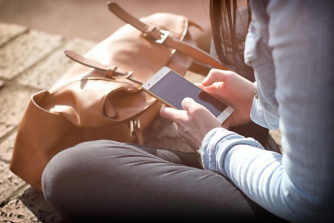 woman using smart phone