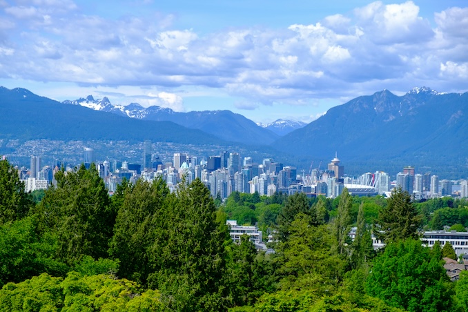 downtown vancouver and mountains